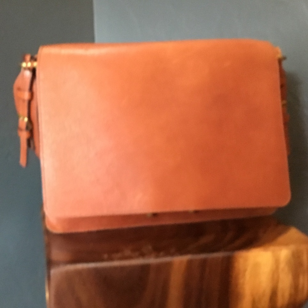 Fossil leather purse with belted strap
